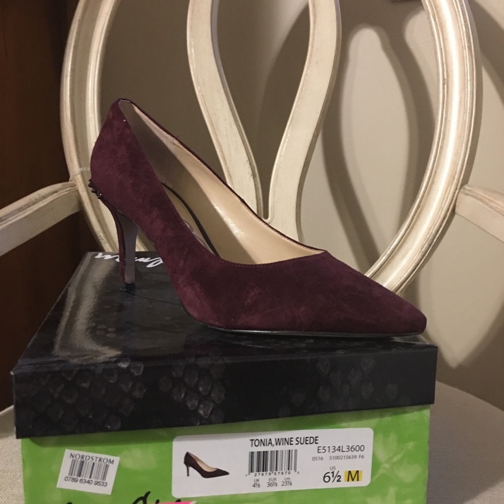 Cranberry suede heels with spikes